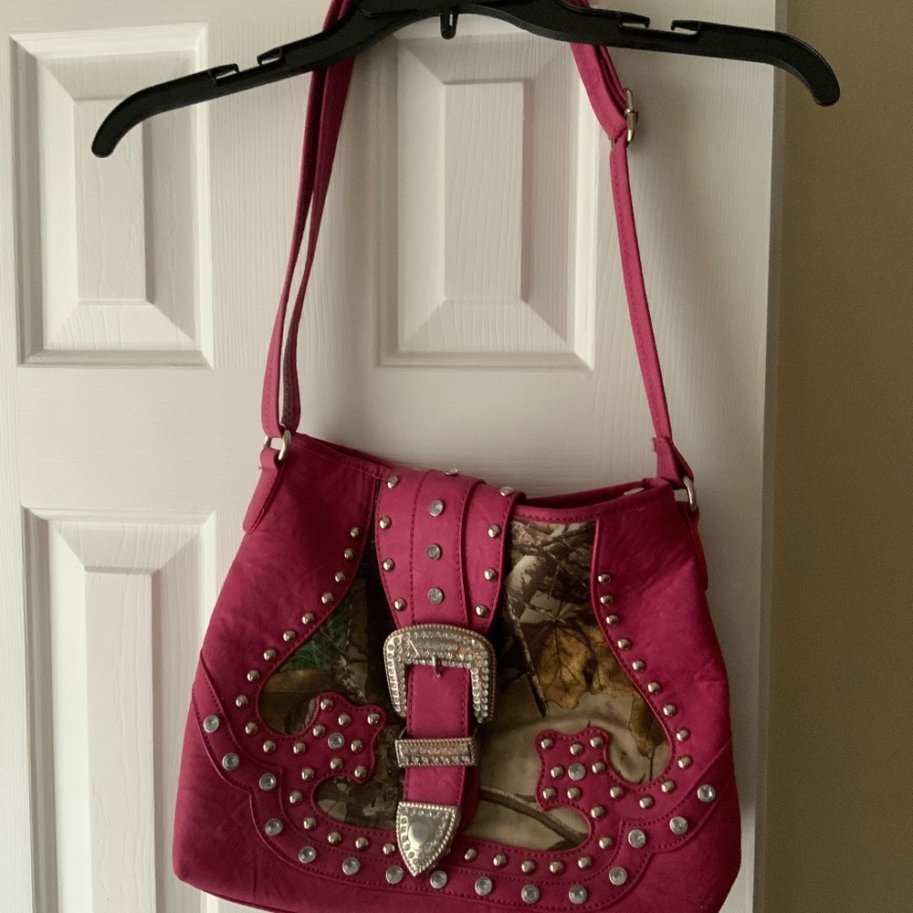Pink leather safari design handbag